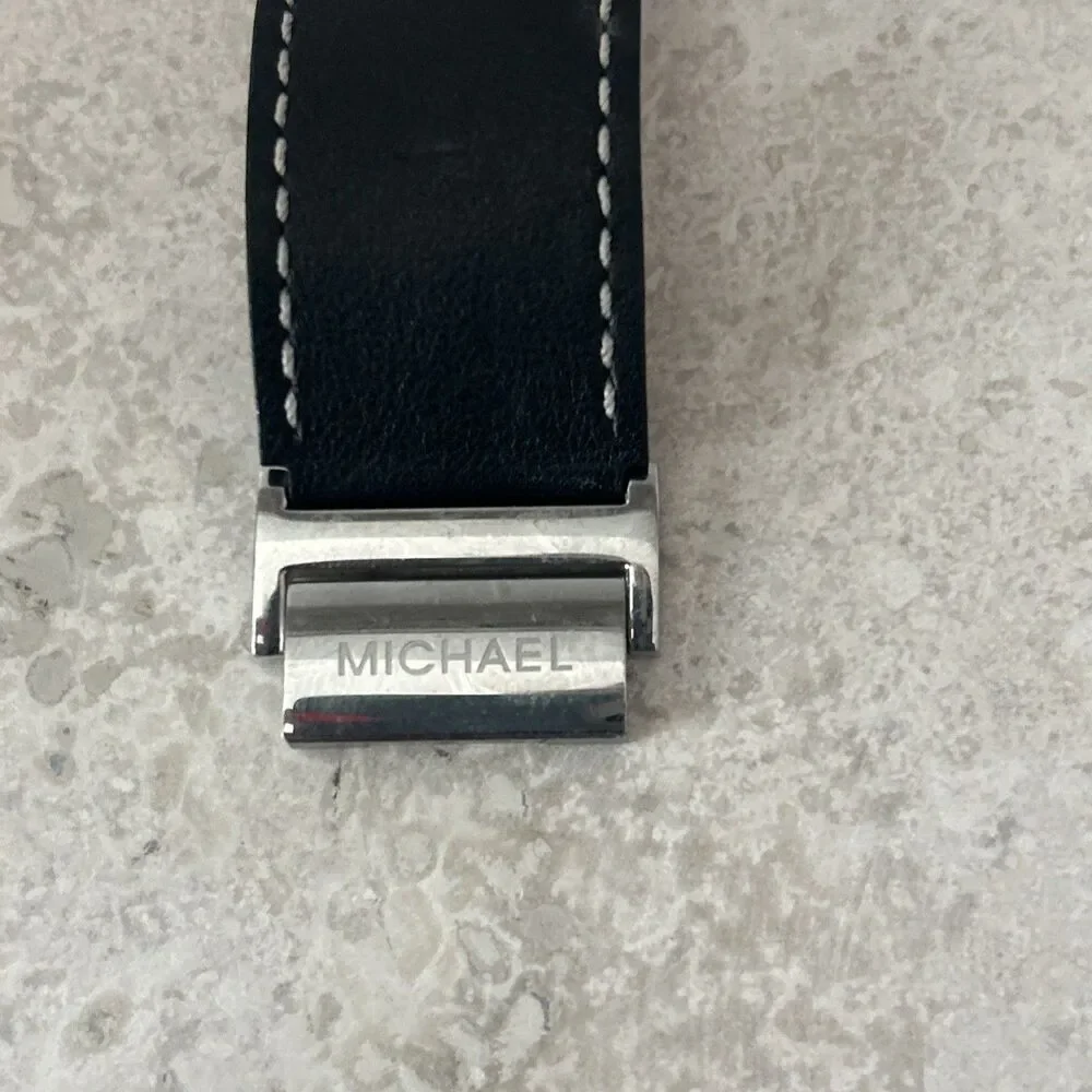 Michael Kors Women’s Rectangle Quartz Watch Silver Dial Black Leather Strap Date